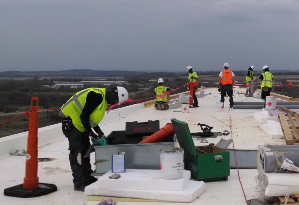 Commercial roofers building flat roof